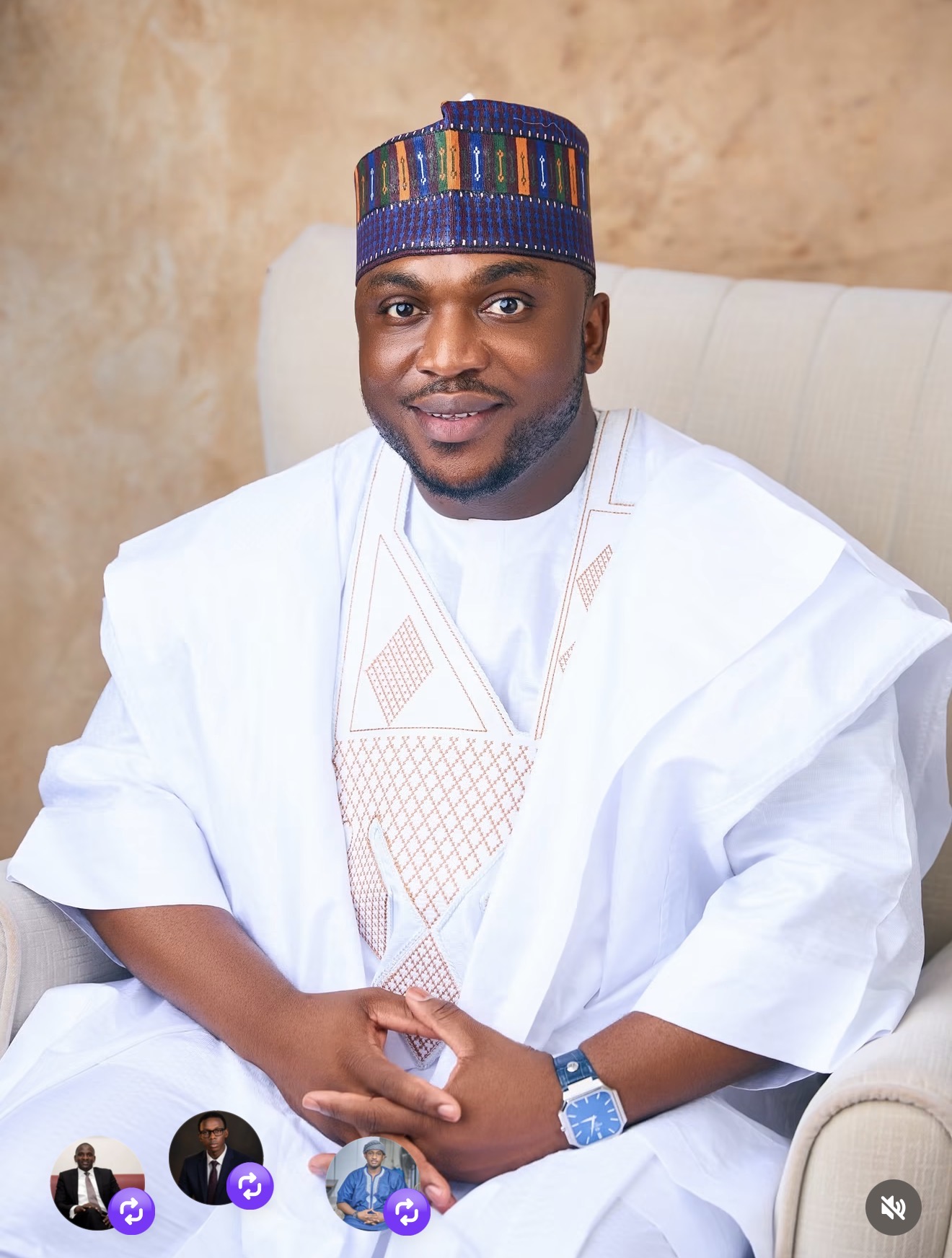 Sadiq Ahmad Bello seated in white traditional attire